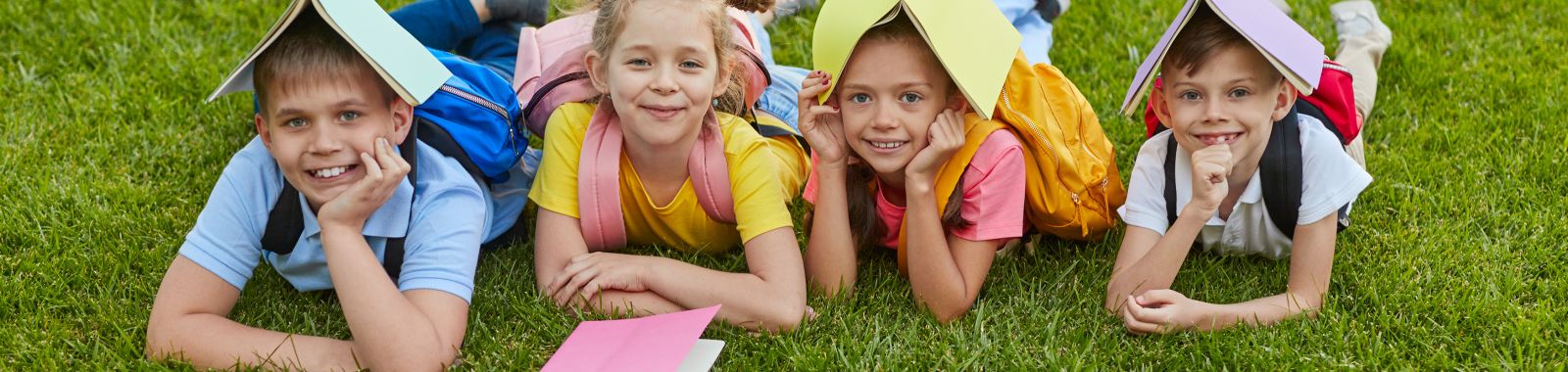boys-girls-with-notepads-resting-after-school